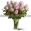 Surprise pink-roses-in-glass-vase