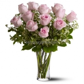Surprise pink-roses-in-glass-vase